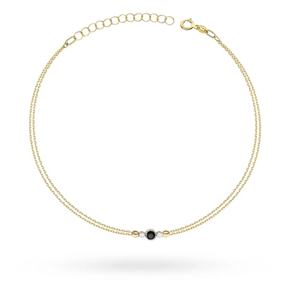 Złota bransoletka z czarnym diamentem 0,12ct i brylantami  0,029ct B0003