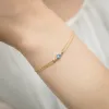 Złota bransoletka z topazem 0,15ct i brylantami 0,029ct B0005