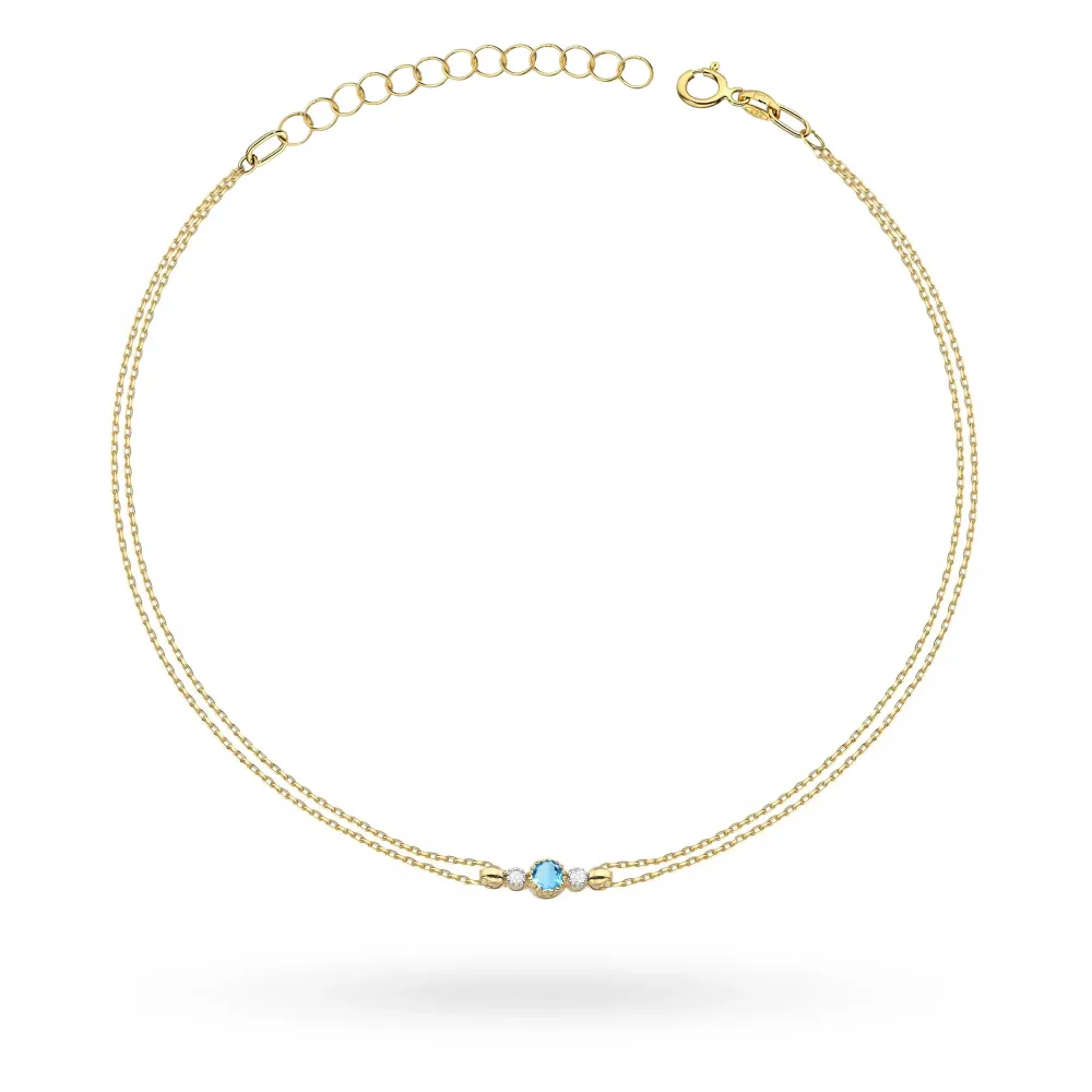 Złota bransoletka z topazem 0,15ct i brylantami 0,029ct B0005