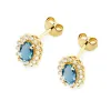 Złote kolczyki z topazem london blue 1,00ct i brylantami 0,24ct K0514