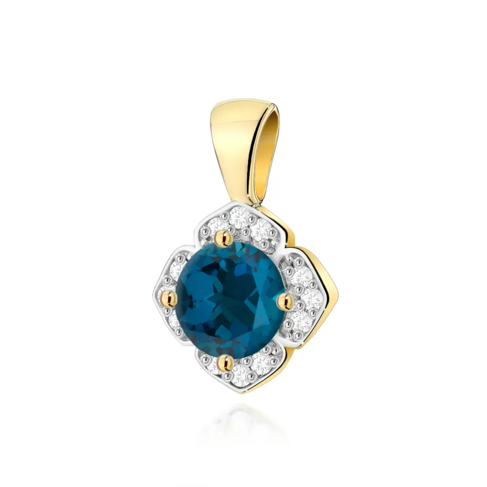 Złota zawieszka z topazem London Blue 0,50ct i brylantami 0,06ct Z0571