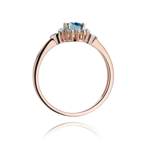 Pierścionek z topazem London Blue 0,50ct i brylantami 0,10ct W0312
