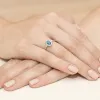 Pierścionek z topazem London Blue 0,50ct i brylantami 0,10ct W0312