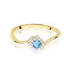 Złoty pierścionek z topaz swiss 0,15ct i brylantami 0,06ct W0702