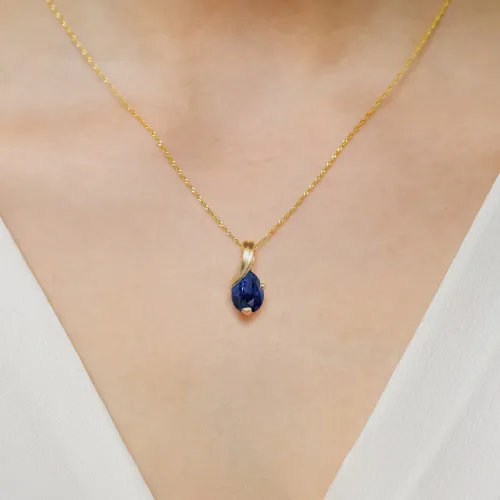 Złota zawieszka z szafirem 0,60ct Z0578