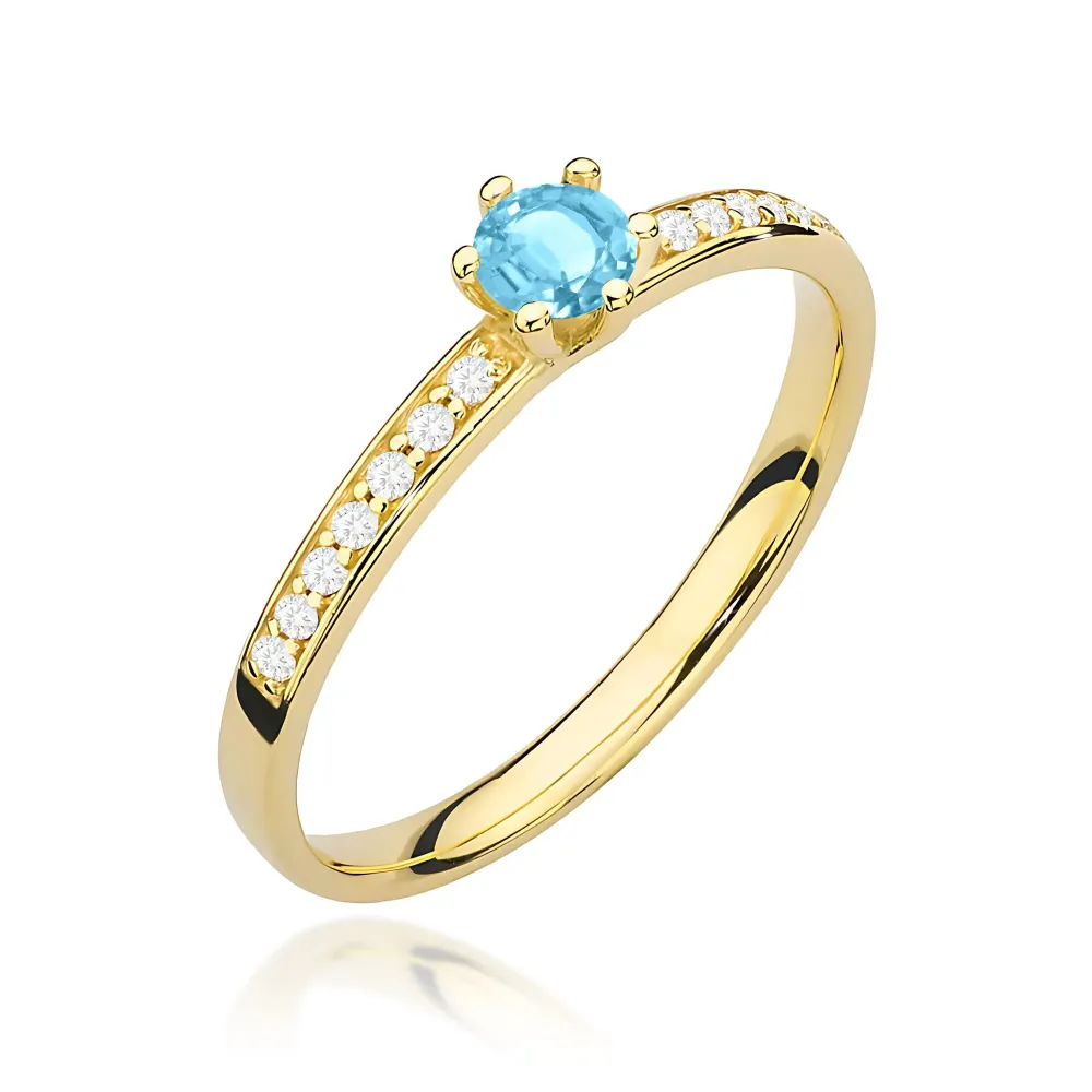 Złoty pierścionek z Topazem 0,15ct W0459