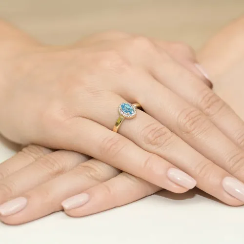 Złoty pierścionek z topazem Swiss 0,50ct i brylantami 0,08ct W0330