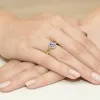 Złoty pierścionek z tanzanitem 0,40ct i brylantami 0,08ct W0330