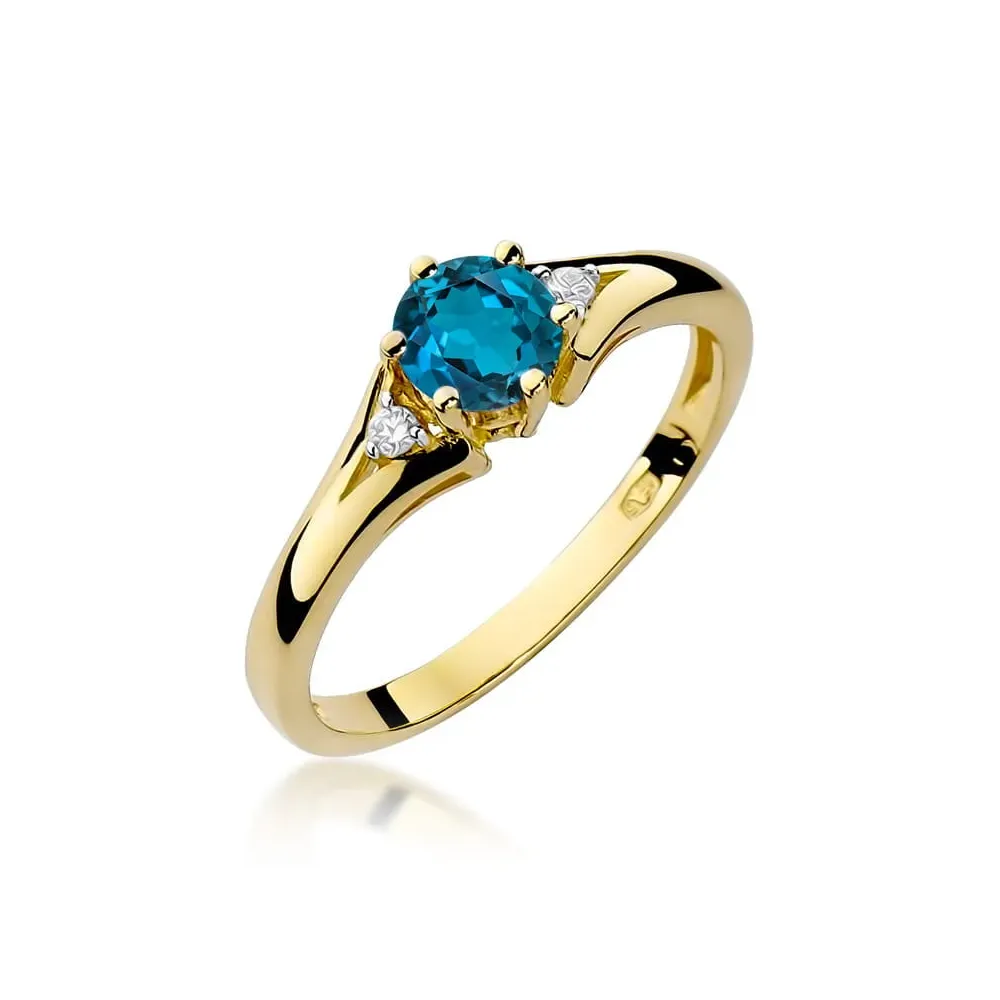 Złoty pierścionek z topazem londn blue 0,50ct i brylantami 0,03ct W0076