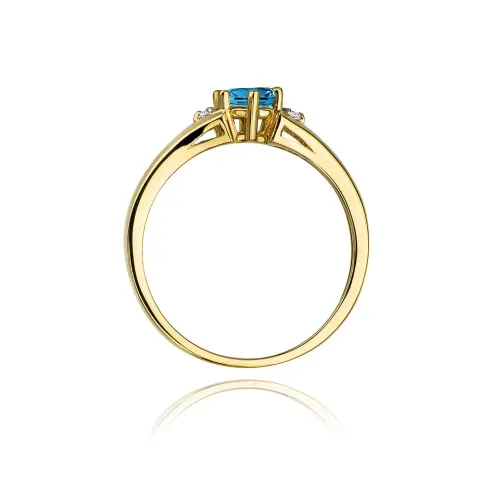 Złoty pierścionek z topazem londn blue 0,50ct i brylantami 0,03ct W0076